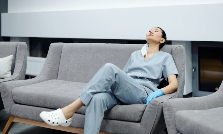 photo of woman resting on the couch