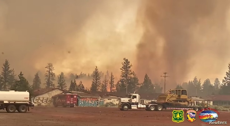 Fire tornado forms at Tennant Fire in the Klamath National Forest, in Macdoel, CA