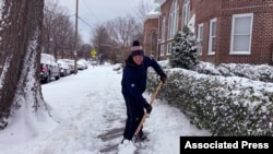 EE. UU.: costas de Virginia y las Carolinas cubiertas de nieve, hielo 59